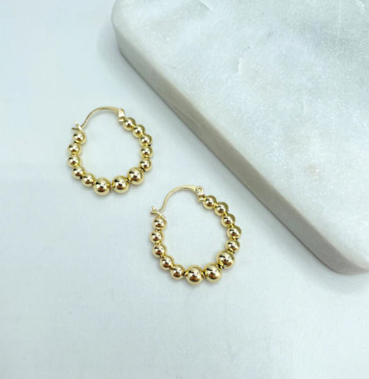 Gold beaded hoop earrings